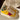 YELLOW STAR SNEAKERS WITH RED STAR PATCH